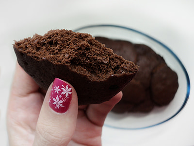 person holding chocolate cookie thumbnail