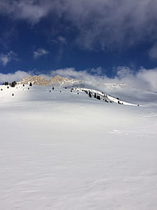 mountain covered by snow during daytime thumbnail