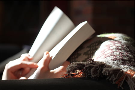 person holding book thumbnail