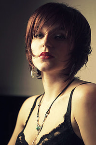 close up photo of woman wearing black lace brassiere thumbnail