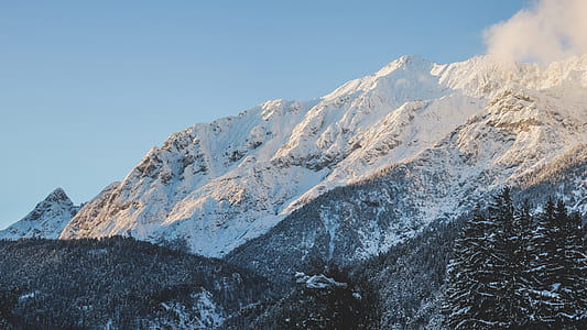 snow coated mountain at daytime thumbnail