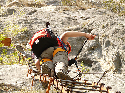 woman climbing mountain ladder thumbnail