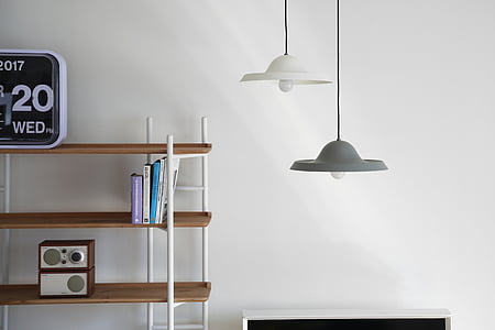 white and gray hanging lamps near brown wooden rack thumbnail