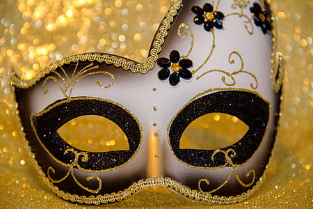 shallow focus photography of brown party mask thumbnail