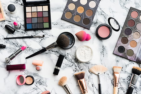 Woman Beauty Makeup Set on White Marble Background thumbnail