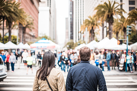 Young Couple Looking on the Other Side of the Crosswalk thumbnail
