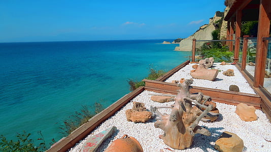 stones on white sand thumbnail
