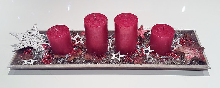 four red wax candles thumbnail