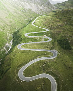 aerial view of curvy road during daytime thumbnail