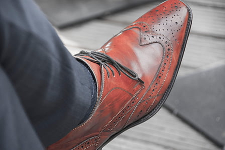 person wearing brogue shoe thumbnail