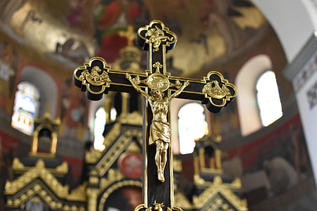 selective focus photography of black and brown crucifix thumbnail