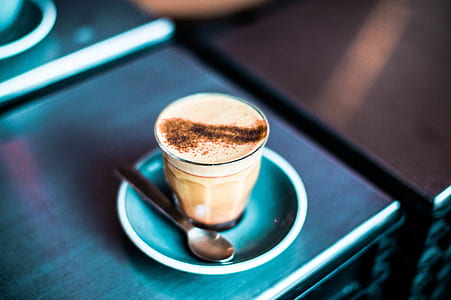 clear drinking glass with latte inside thumbnail