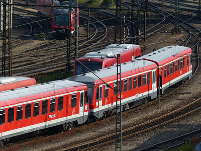 red train during day thumbnail