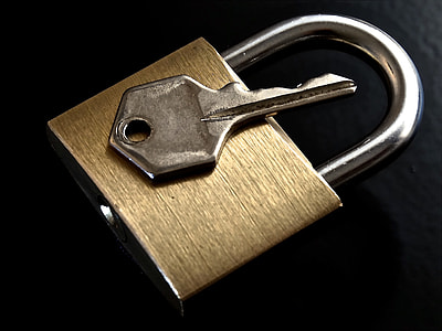 key on brass padlock thumbnail