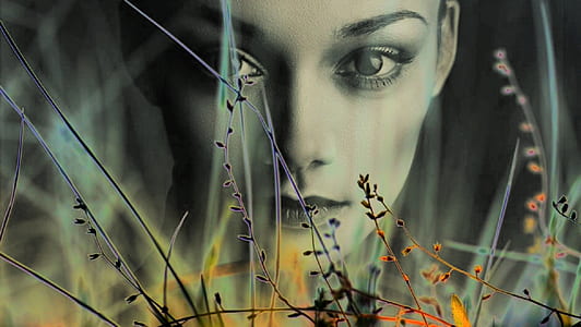 woman's face beside leaves thumbnail