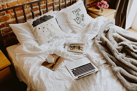 Morning coffee in bed. Working in bed thumbnail