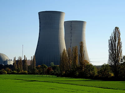 photo of gray power plant near field thumbnail