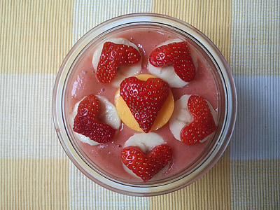 flat lay photography of bowl of strawberry pastry thumbnail
