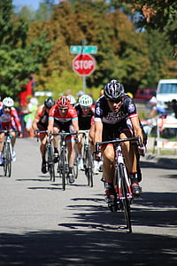 man riding bicycle on road thumbnail