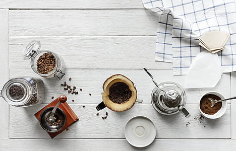 clear glass mug and coffee grinder thumbnail