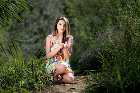 woman near grasses thumbnail