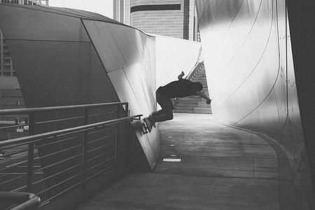 grayscale photo of man skateboarding thumbnail