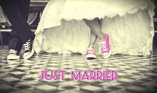 selective color photography of bride's pink low top sneakers thumbnail