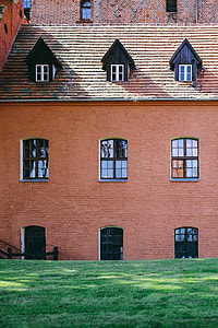 Old red brick church on a sunny day thumbnail