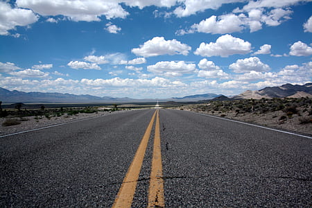 Black Top Road Under Clear Blue Cloudy Sky thumbnail