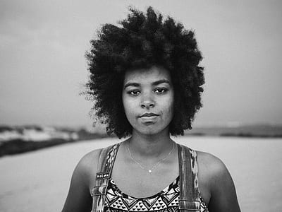 grayscale photograph of woman facing the camera thumbnail