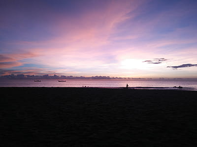 Silhouette Photography of People on Seashore thumbnail