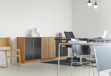 brown wooden chair beside sideboard thumbnail