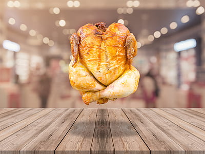 selective focus photo of roasted chicken with bokeh effect background thumbnail