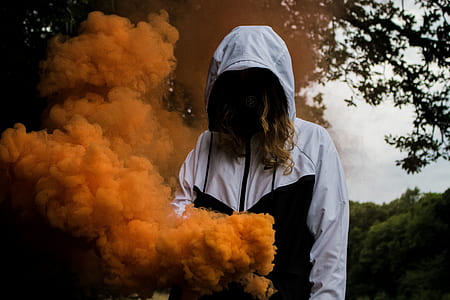 person wearing white and black zip-up hooded windbreaker thumbnail