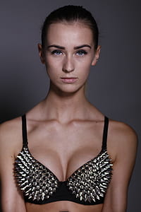woman wearing grey spiky black push-up bra thumbnail