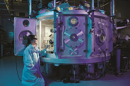 photograph of person near machine thumbnail