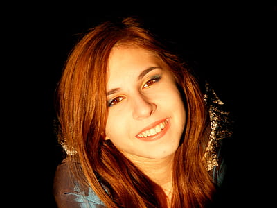 red haired woman close-up photo thumbnail