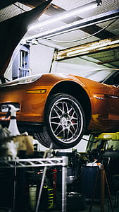 brown car in the garafe thumbnail