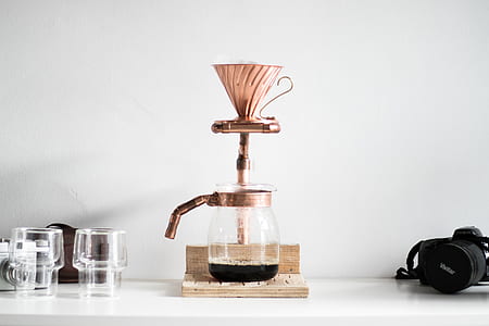 brown coffeemaker filled with coffee thumbnail