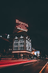 Dispatch neon signage on top of building thumbnail