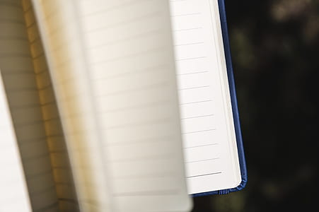 opened black lined notebook thumbnail