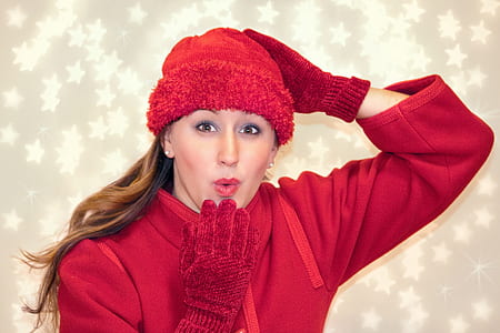 woman wearing red sweatshirt with red hat thumbnail