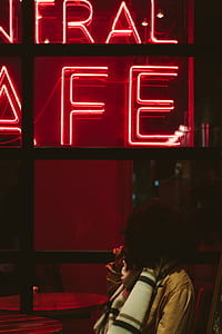 woman sitting on chair looking at the window thumbnail