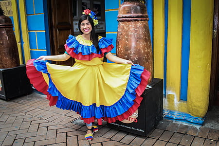 woman standing beside door thumbnail