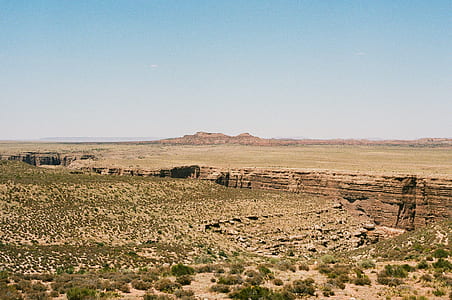 valley with green grasses during daytime thumbnail