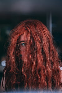 woman covering her face with hair thumbnail