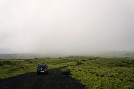 brown car on road thumbnail