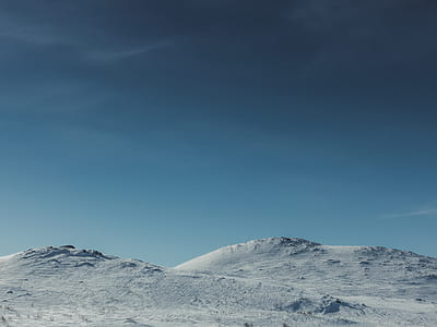 snowfield hill during daytime thumbnail