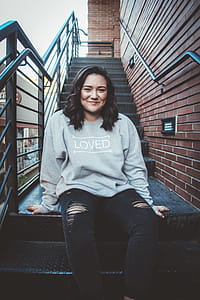 Woman Sitting At A Staircase thumbnail