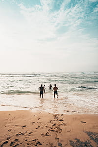 men running on beach thumbnail